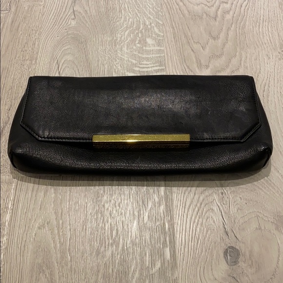 J. Crew Handbags - JCrew Black Leather Clutch Gold Detail Suede Int.